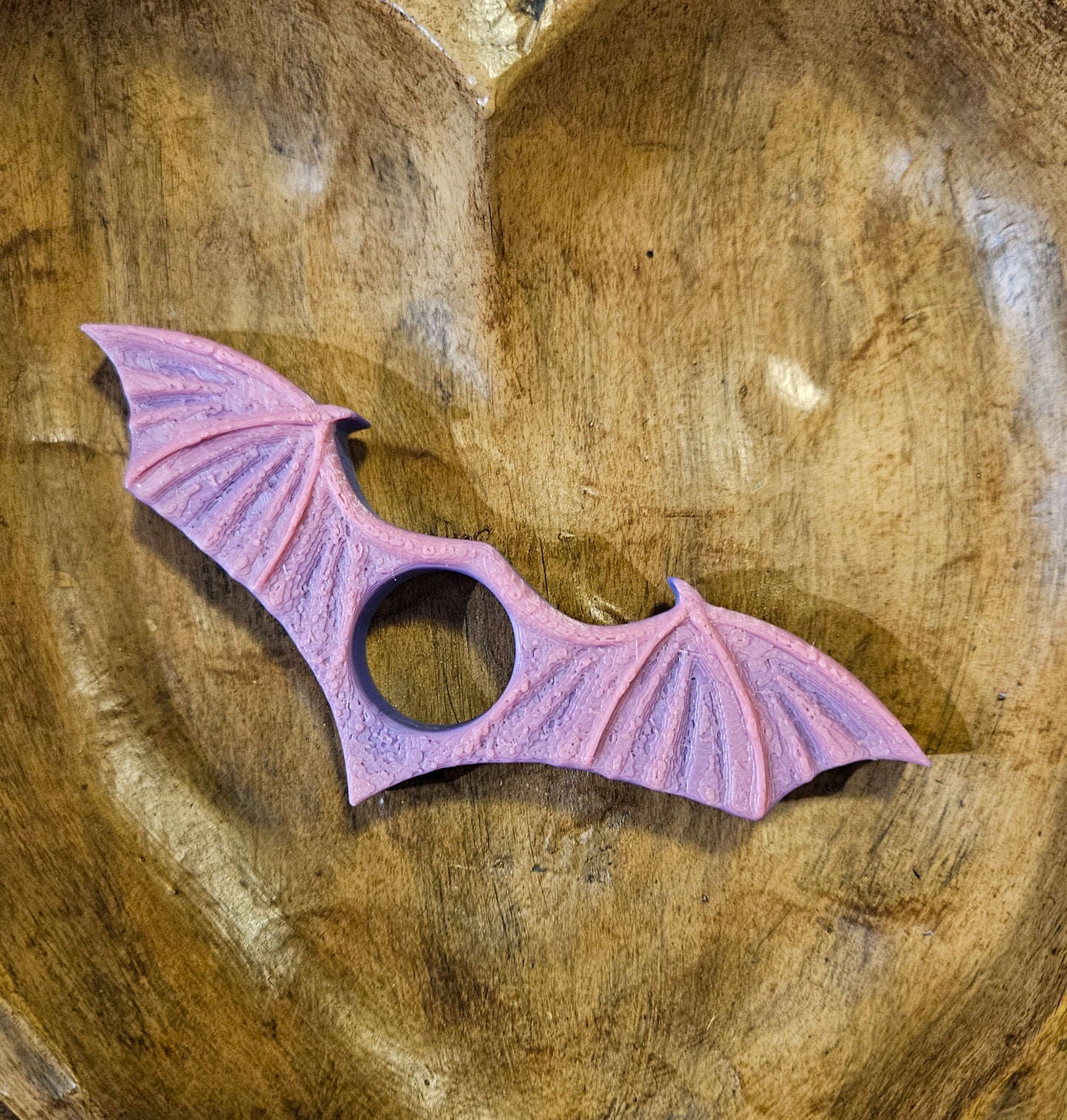 Bat wing page holder