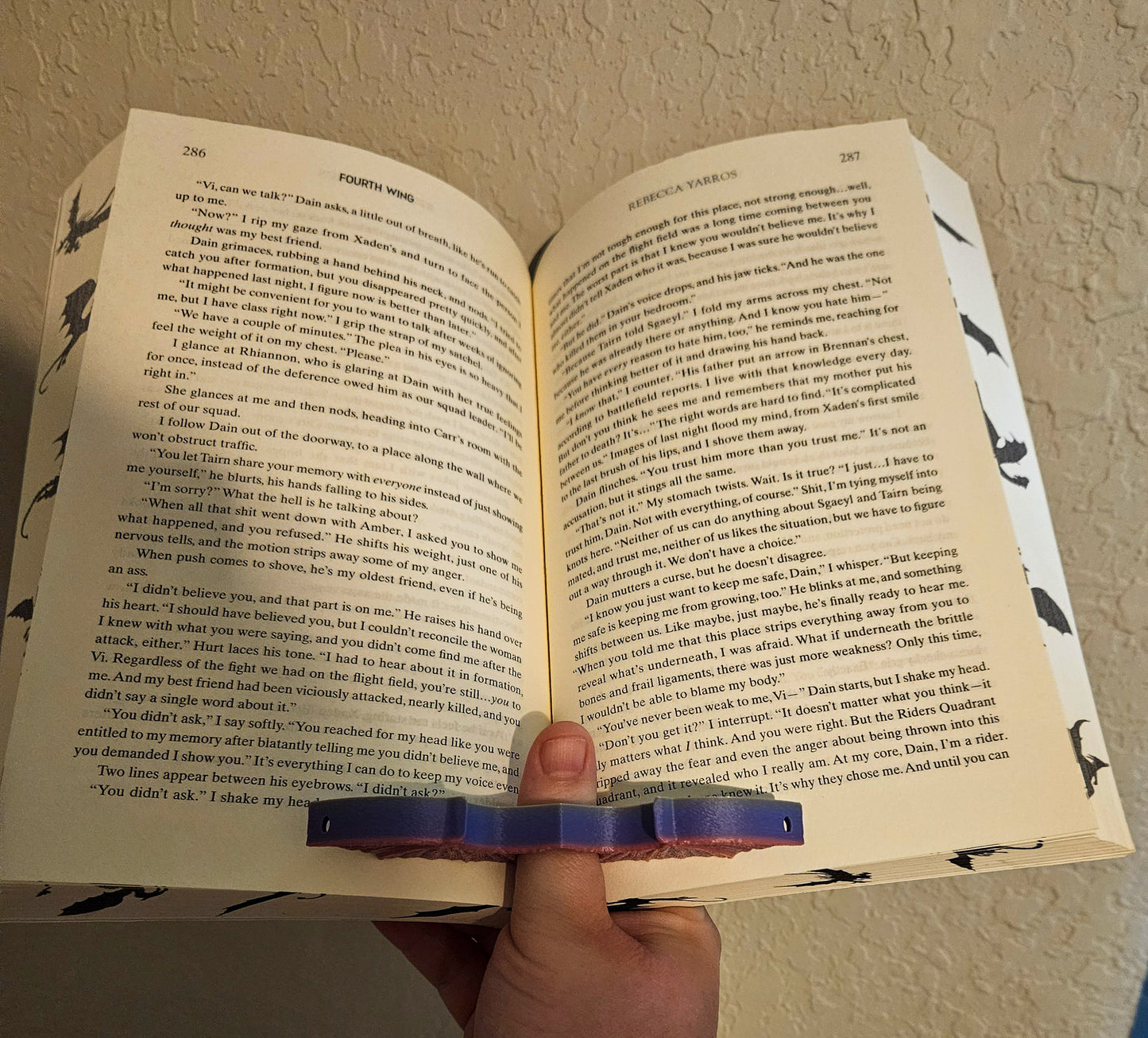 Bat wing page holder